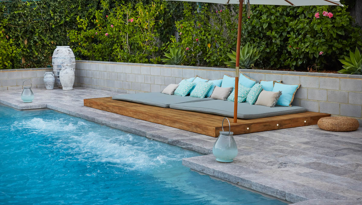An inviting poolside space at the end of the day
